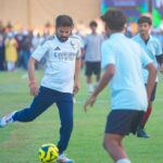 CM Revanth Reddy playing football